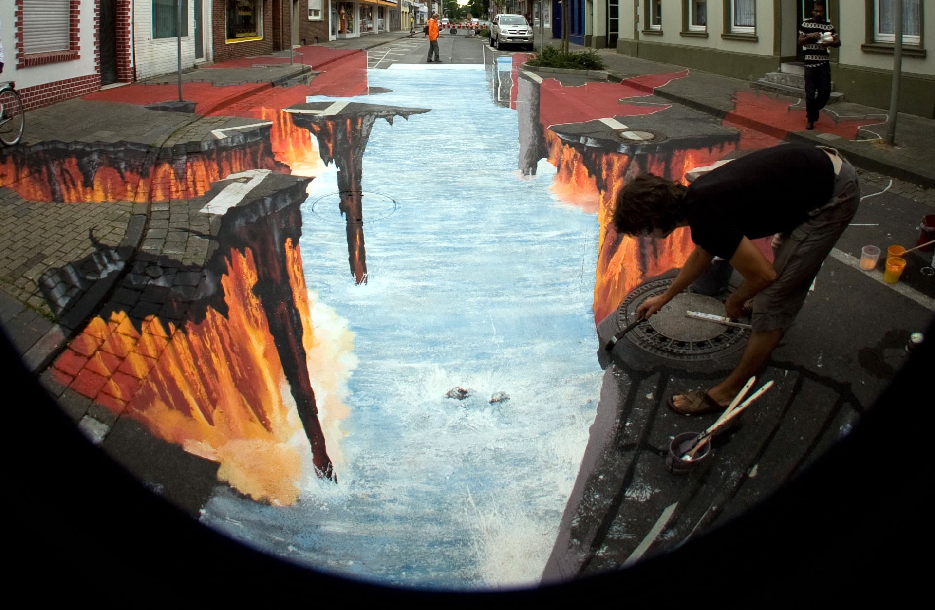 Street with crevasse and river.