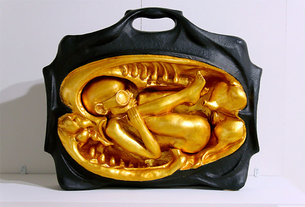 Baby model in iron.